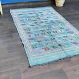 Faded blue Berber ethnic carpet