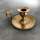 Hand candlestick in massive brasse