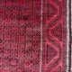 Vintage handmade Baluch rug with geometric pattern from the 1950s.