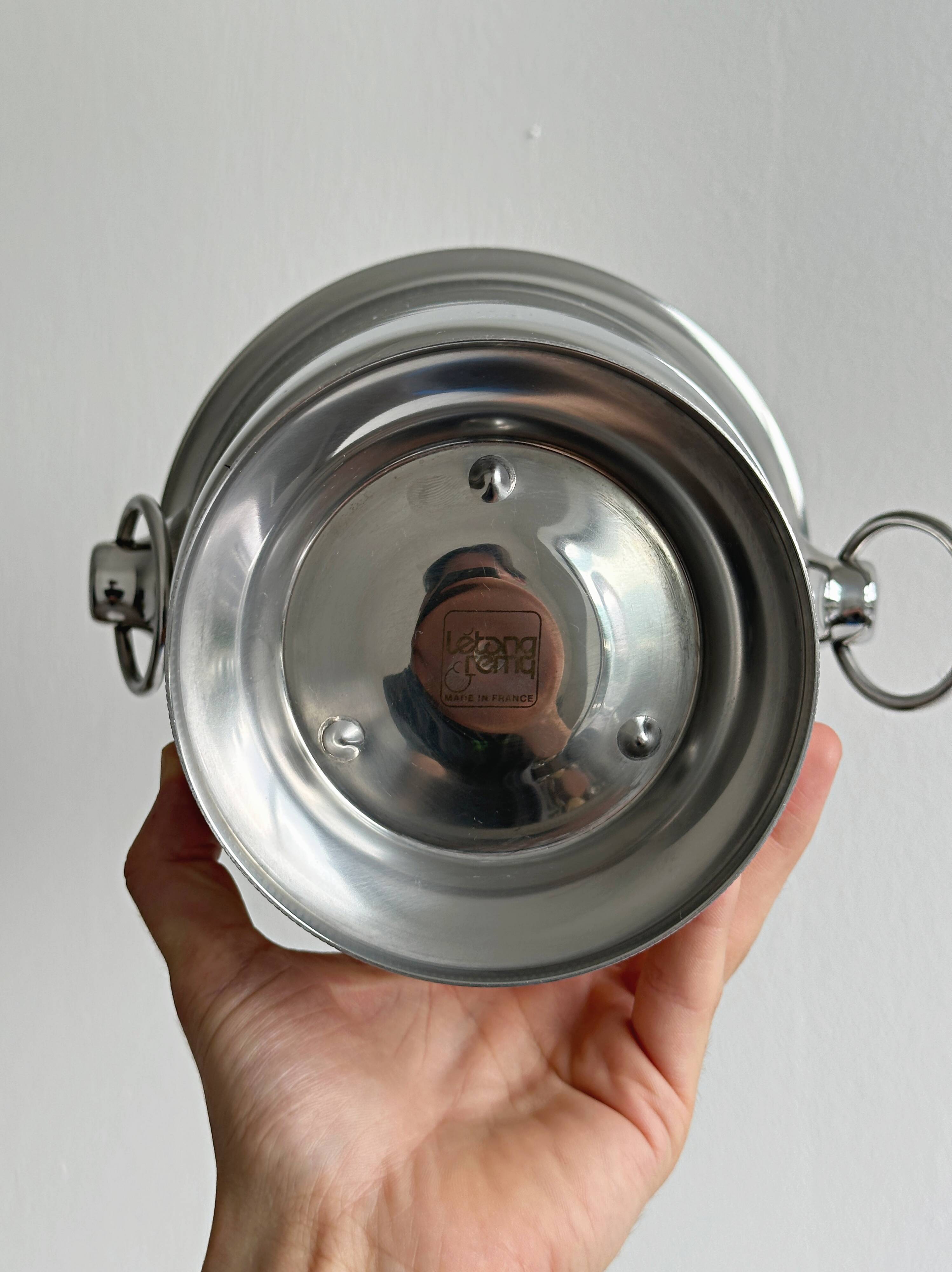 Shiny stainless steel champagne bucket