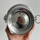 Shiny stainless steel champagne bucket