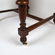 Neo-Renaissance walnut armchair with lion heads, circa 1880