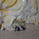 Ceramic dog sculpture from the 1940s-50s.