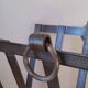 Brutalist magazine rack in forged steel, 1950.