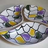 Three vintage free-form ceramic ravine dishes from the 1950s