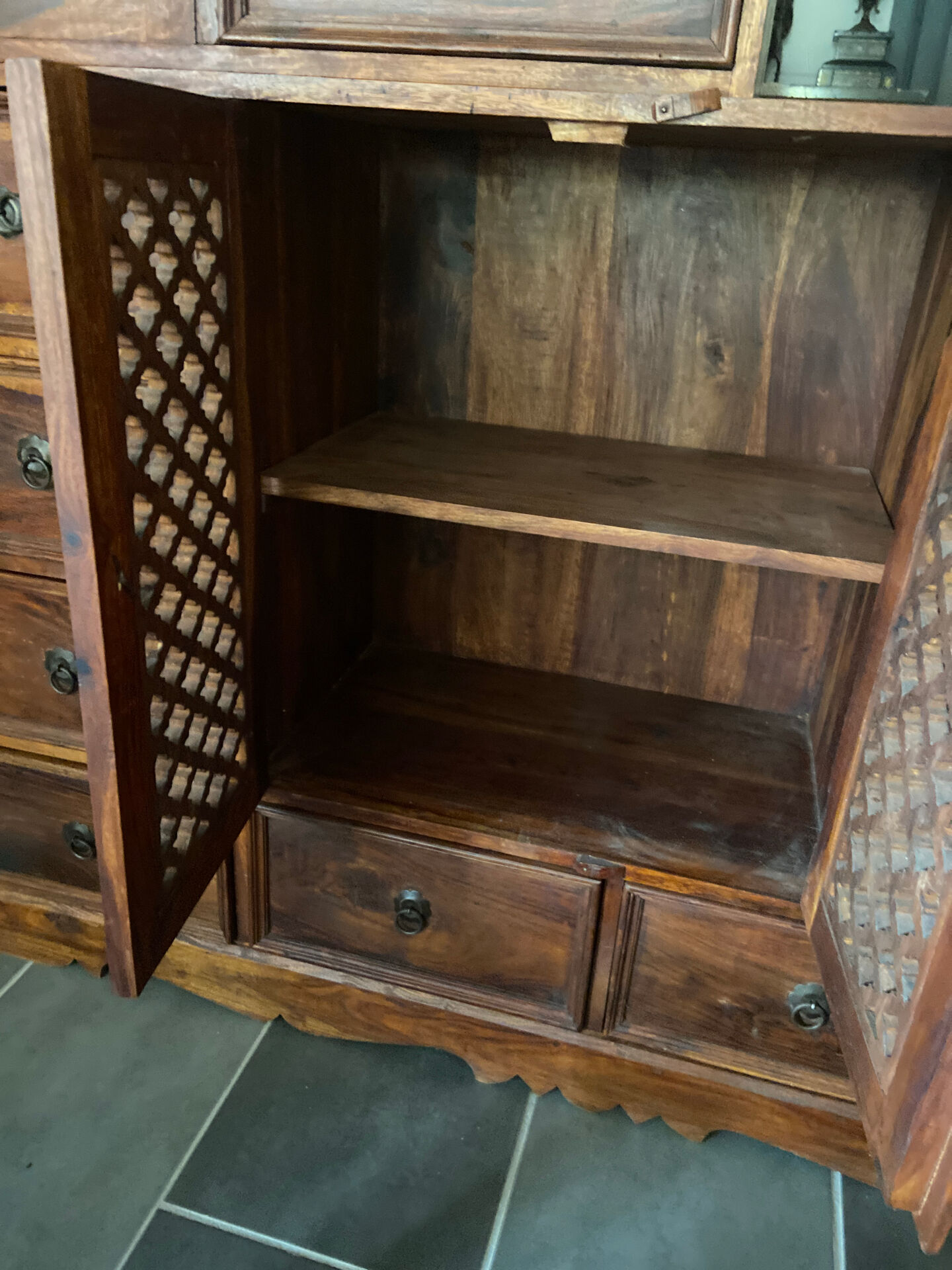 Indonesian staircase furniture in rosewood and wrought iron.