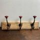 Wall hook with three hooks in wood, wrought iron, porcelain balls