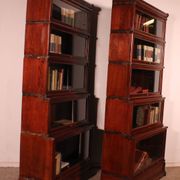 pair of Globe Wernicke London 'waterfall' bookcases in mahogany circa