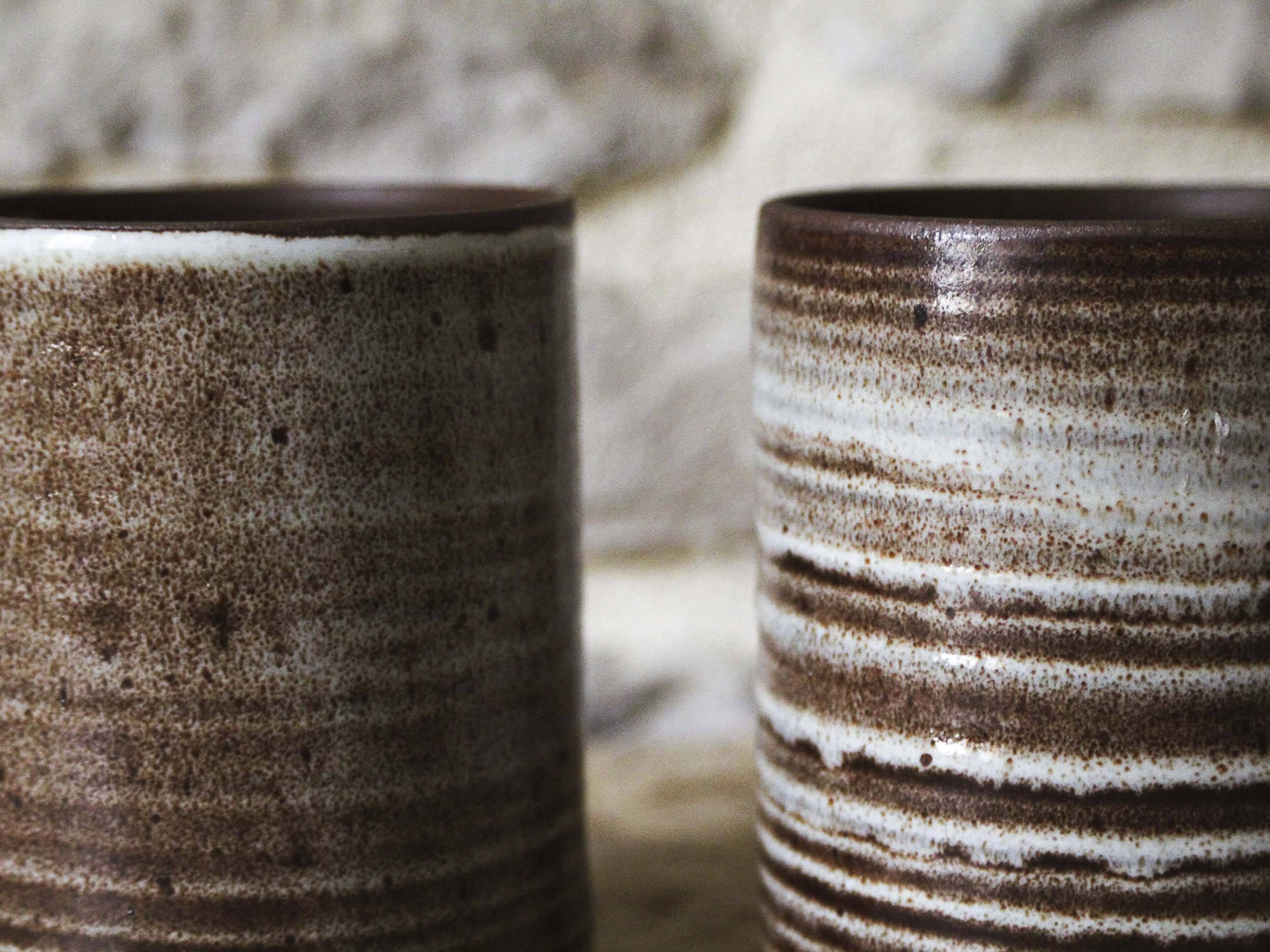 Pair of Roger Jacques Puisaye enameled stoneware cups