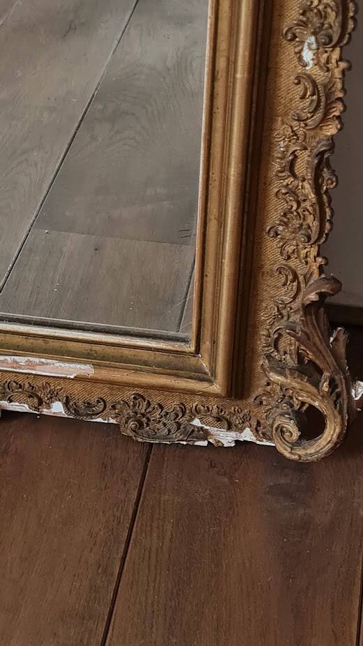 Antique Louis Philippe mirror with a pediment.