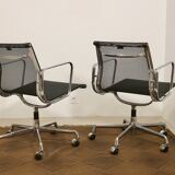 Set of 2 Charles and Ray Eames armchairs by Vitra model EA 117