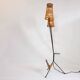 Two-light floor lamp in metal and wicker from the 1950s-60s.