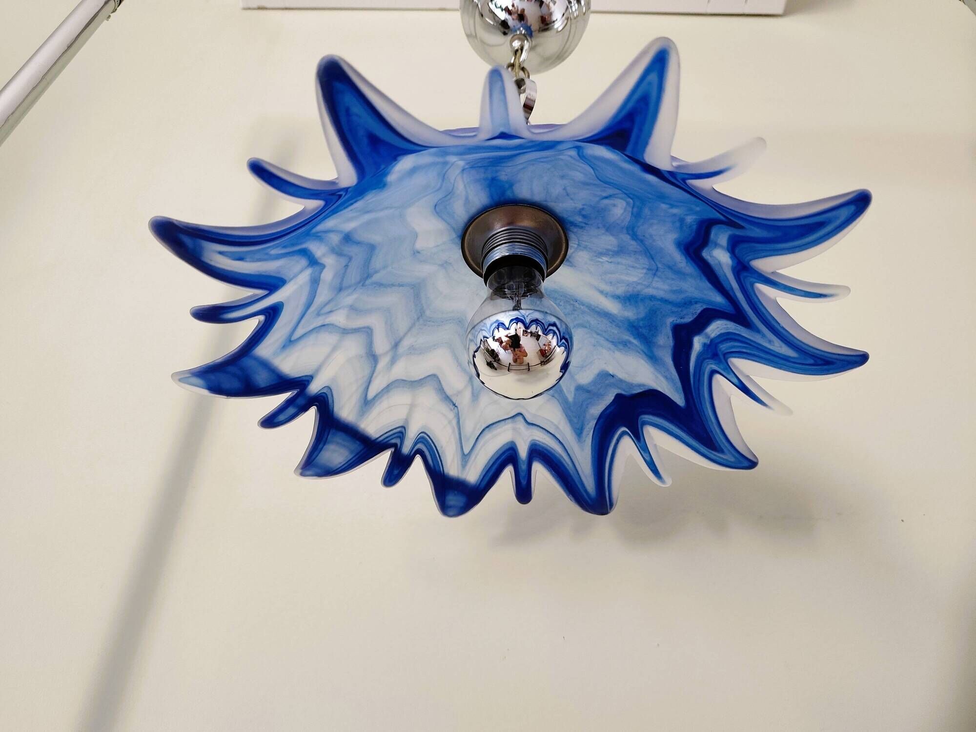 Vintage blue and white stylised flower pendant