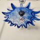 Vintage blue and white stylised flower pendant