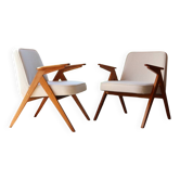 2 fauteuils scandinaves en tissu bouclé blanc