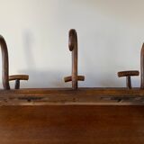 Wooden coat rack turned upside down