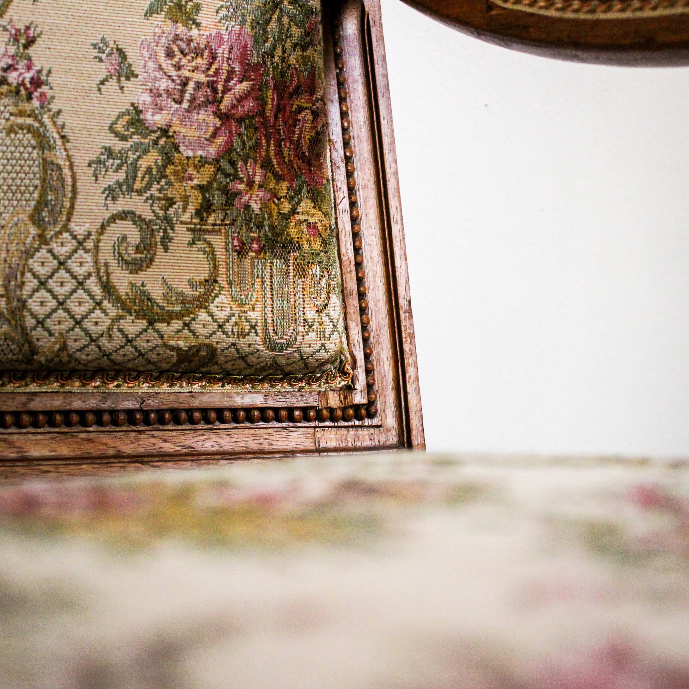 Louis XVI style carved armchair