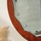 Vintage round teak mirror from the 1960s.