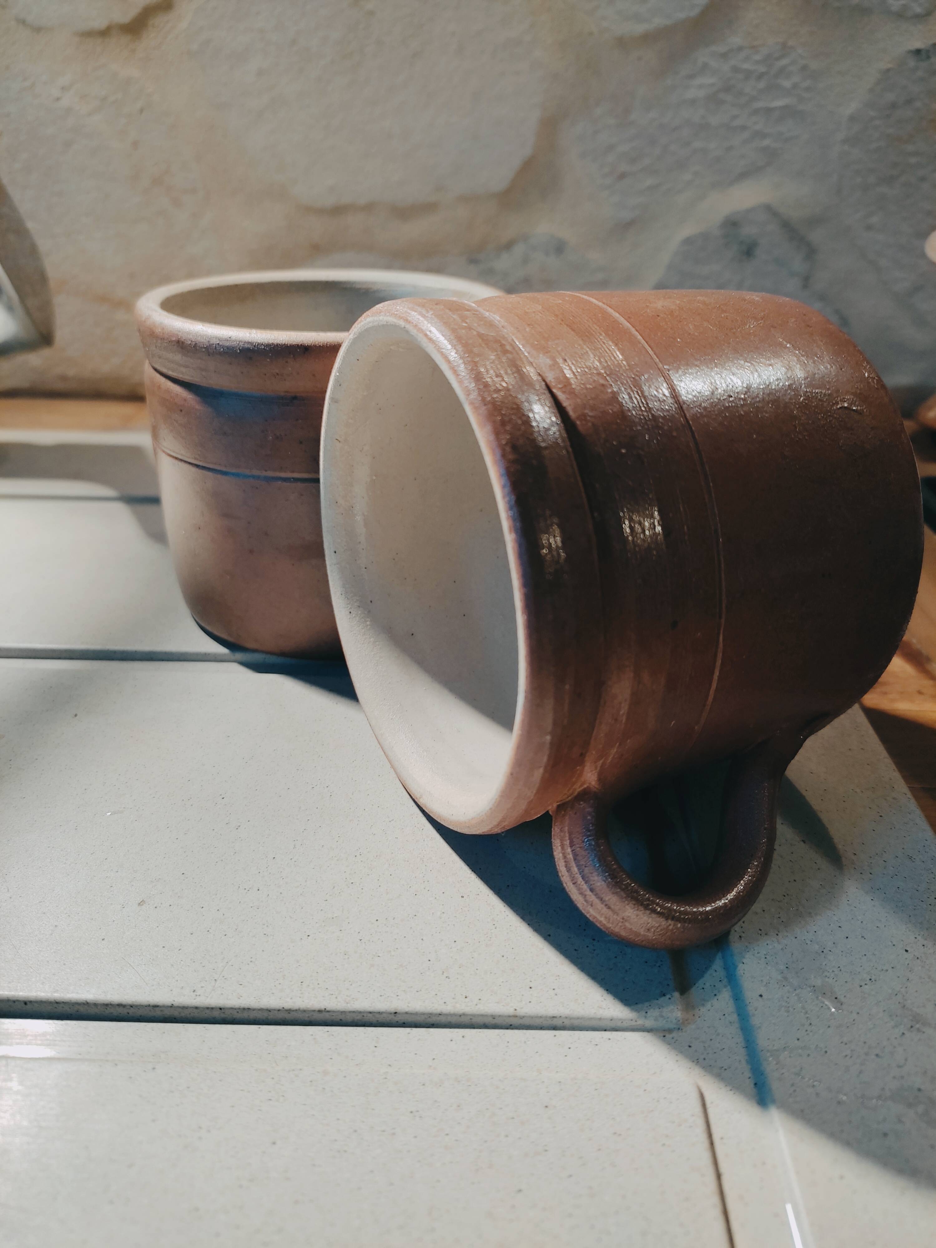 2 sandstone mugs