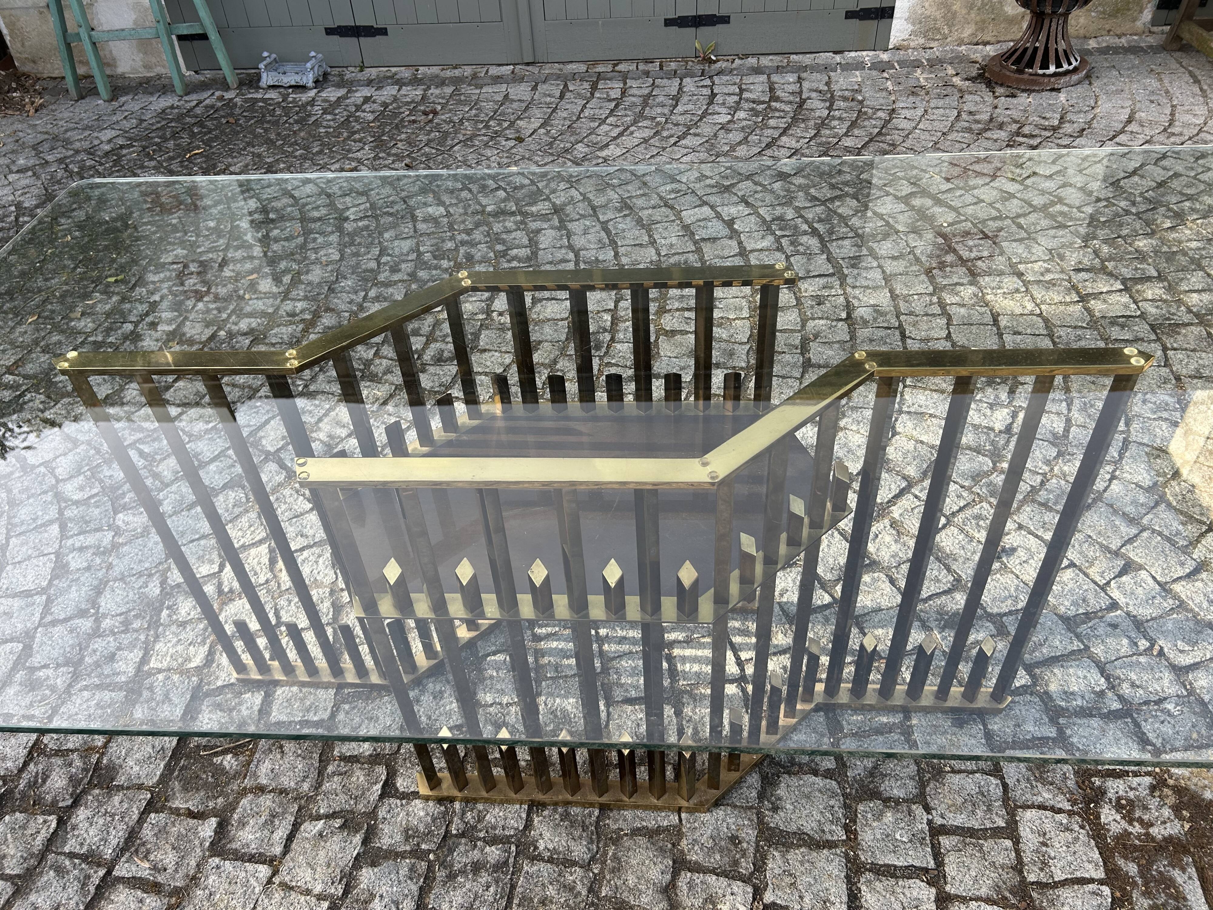 Rectangular glass dining table with brass legs, 1970s.