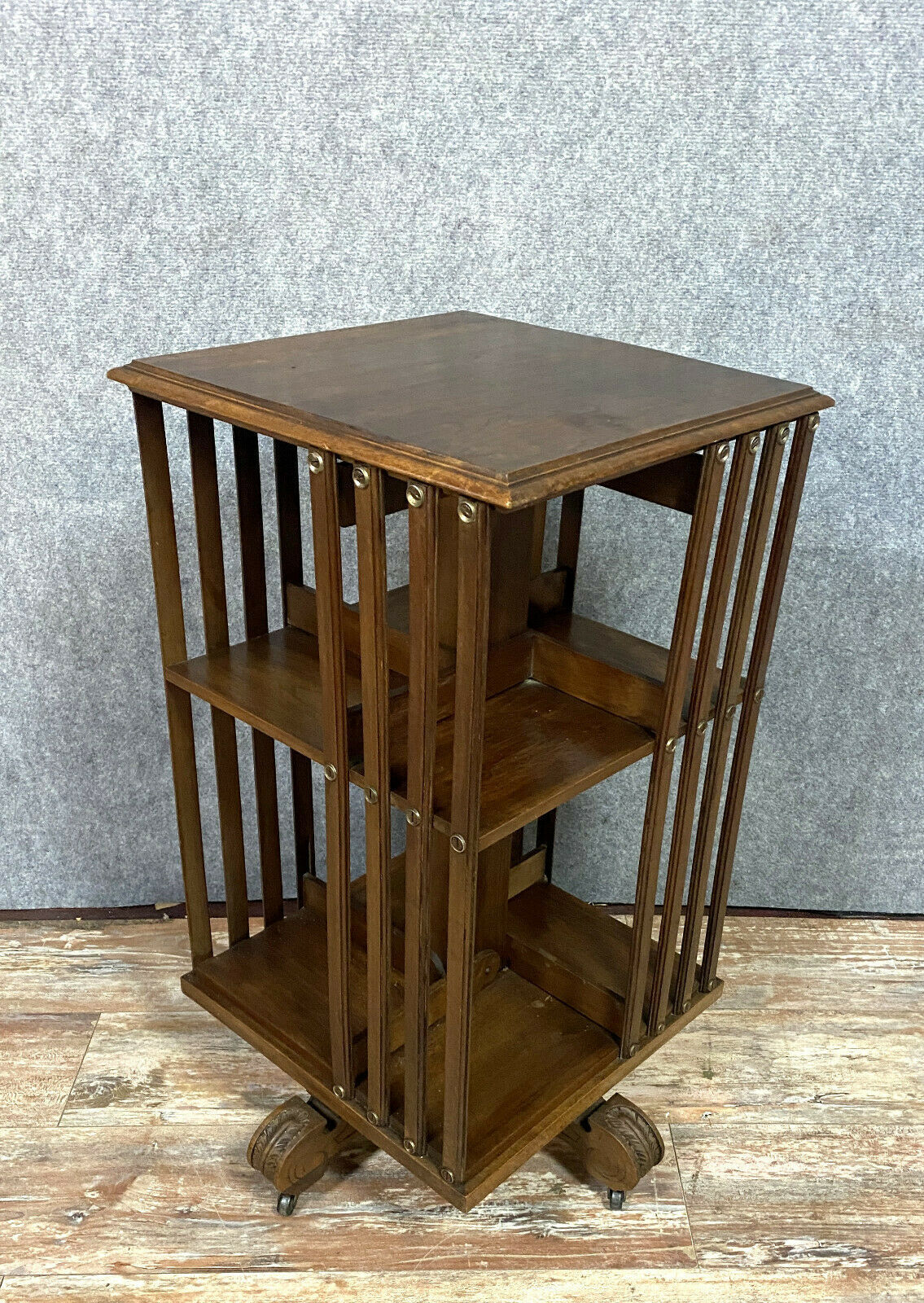 Revolving library with mahogany bars circa 1900