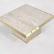 Square coffee table from the 70s in travertine and brass.