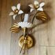 Pair of vintage Florentine wall lights in gilded metal – 1960s