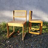 Pair of vintage varnished wood tanned chairs