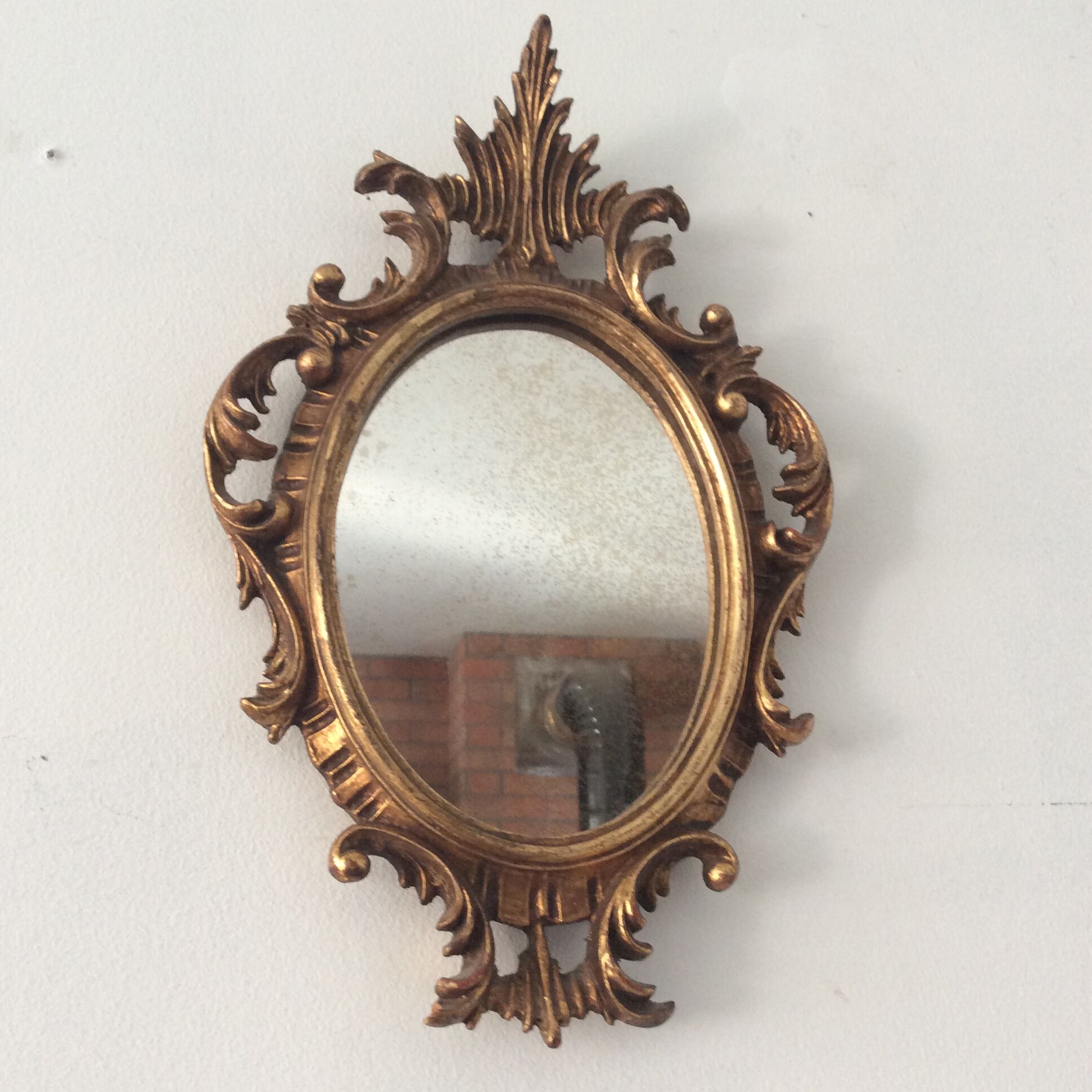 Old mirror in gilded wood 17x12cm