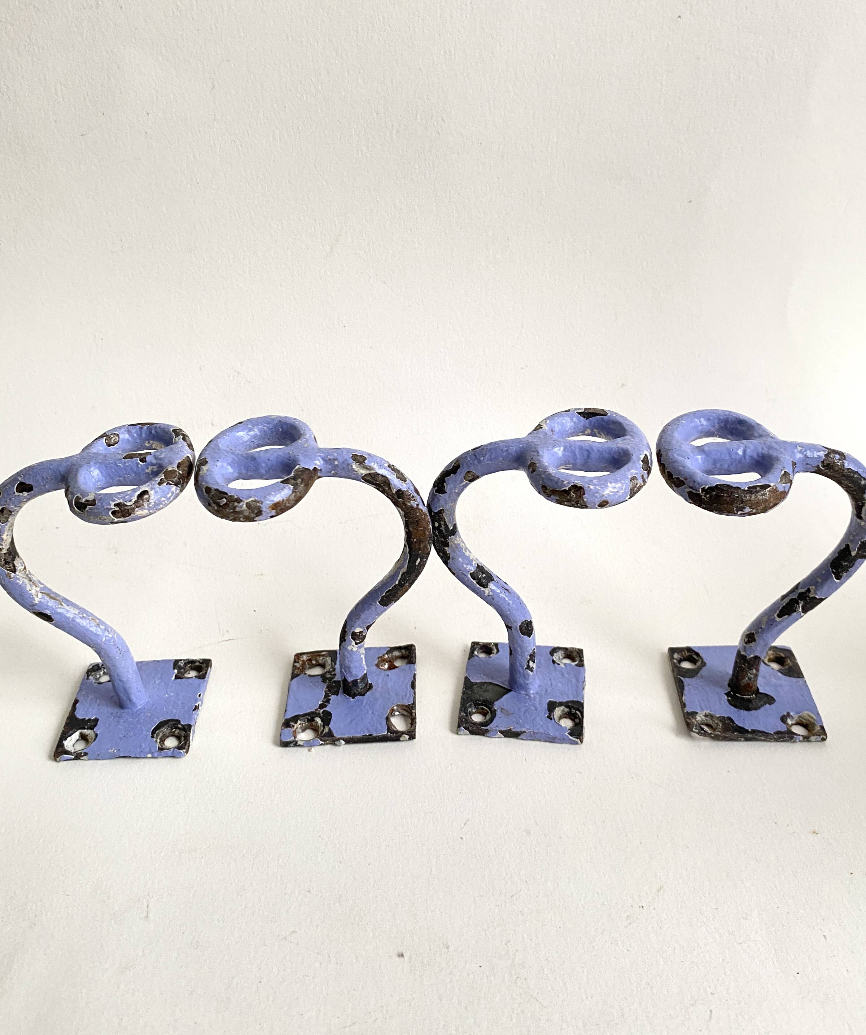 Set of painted cast iron industrial coat hooks