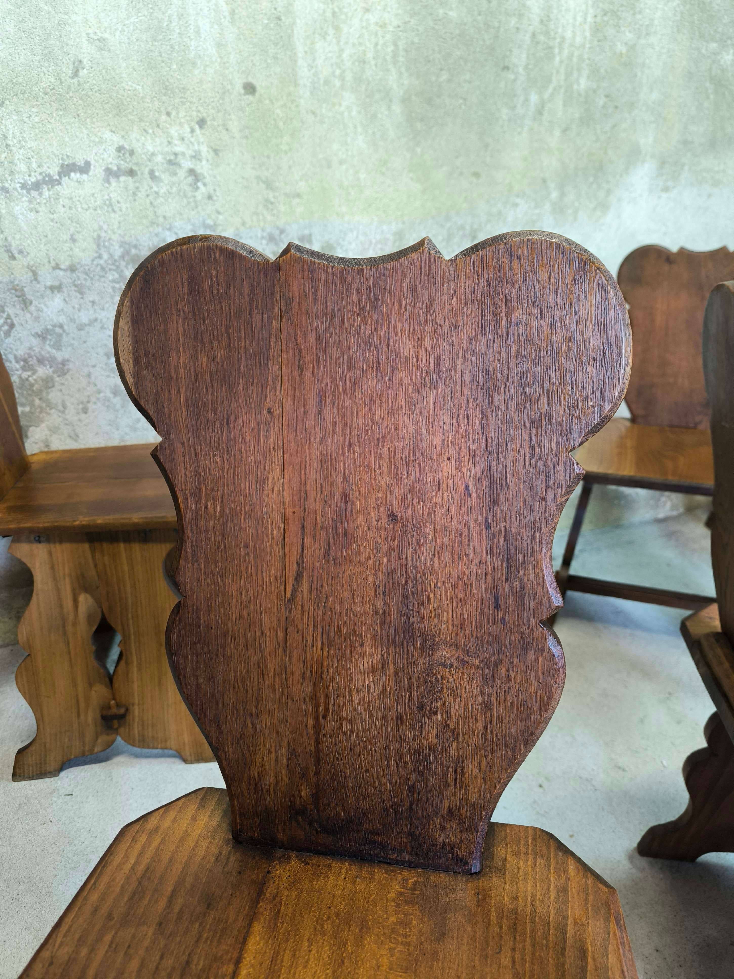 Set of six vintage brutalist wooden chairs.