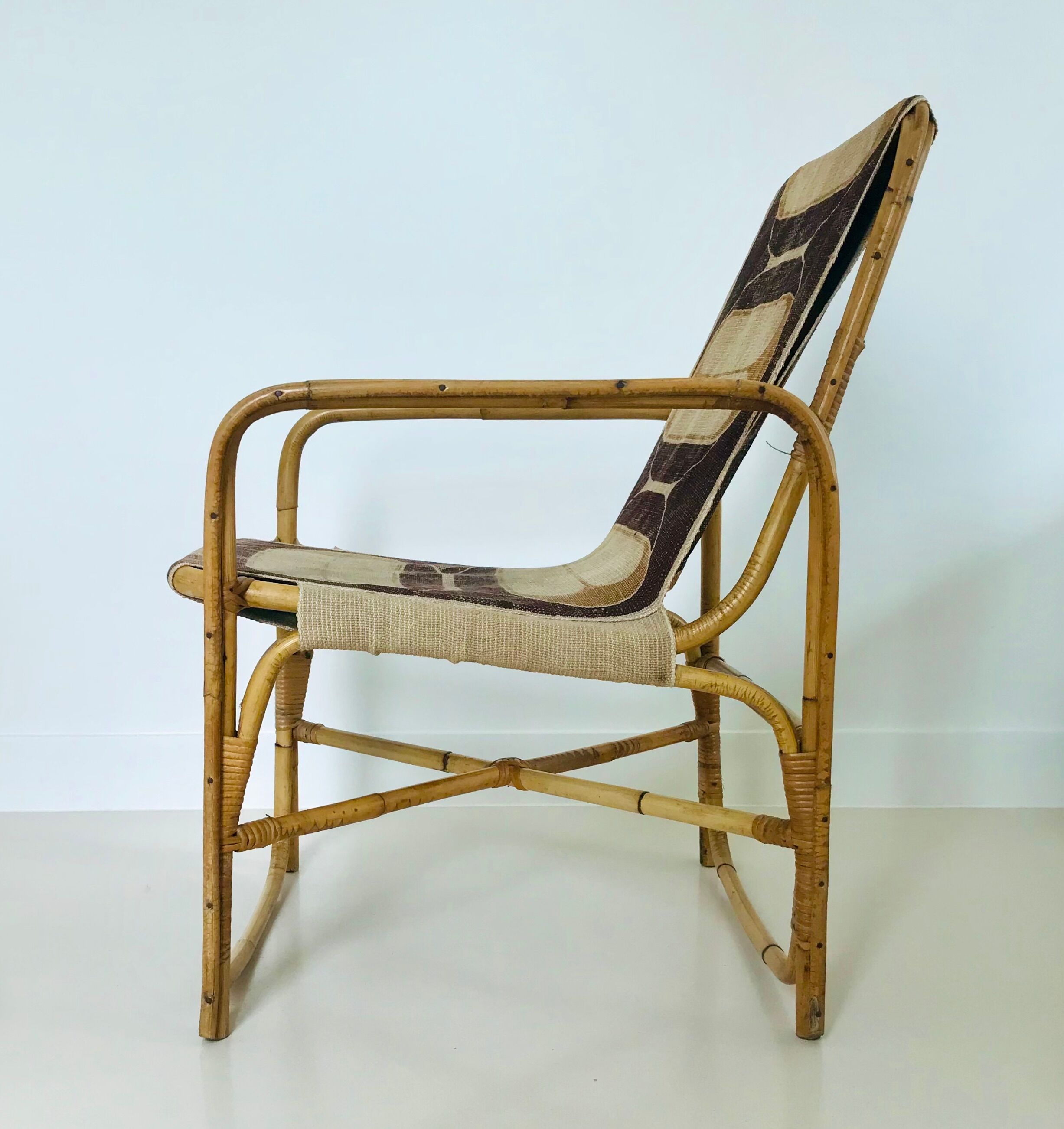 Rattan armchair and fabric, France 60s