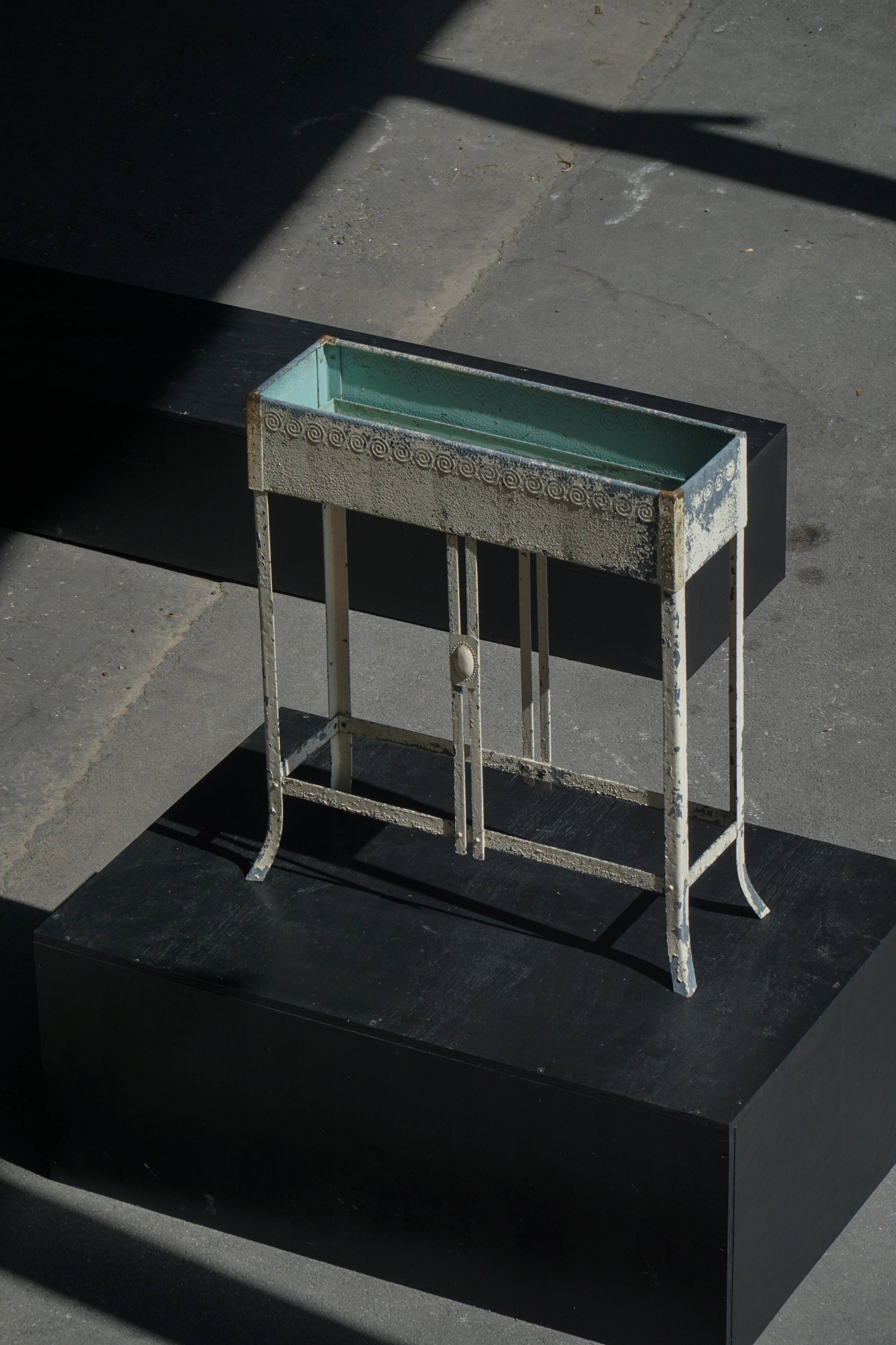 Painted metal planter on a stand, Art of Vintage, 1920s