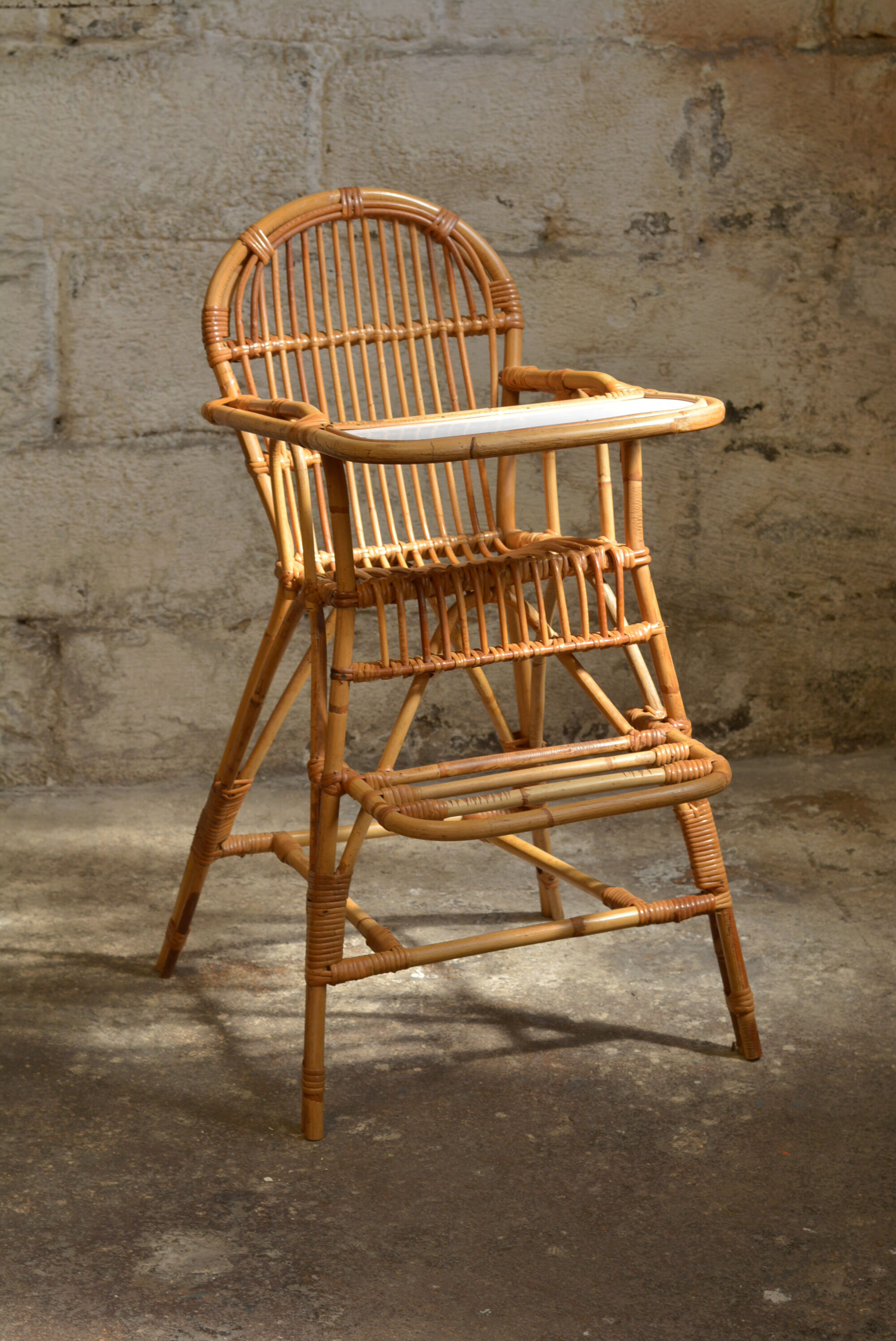 Vintage rattan high chair