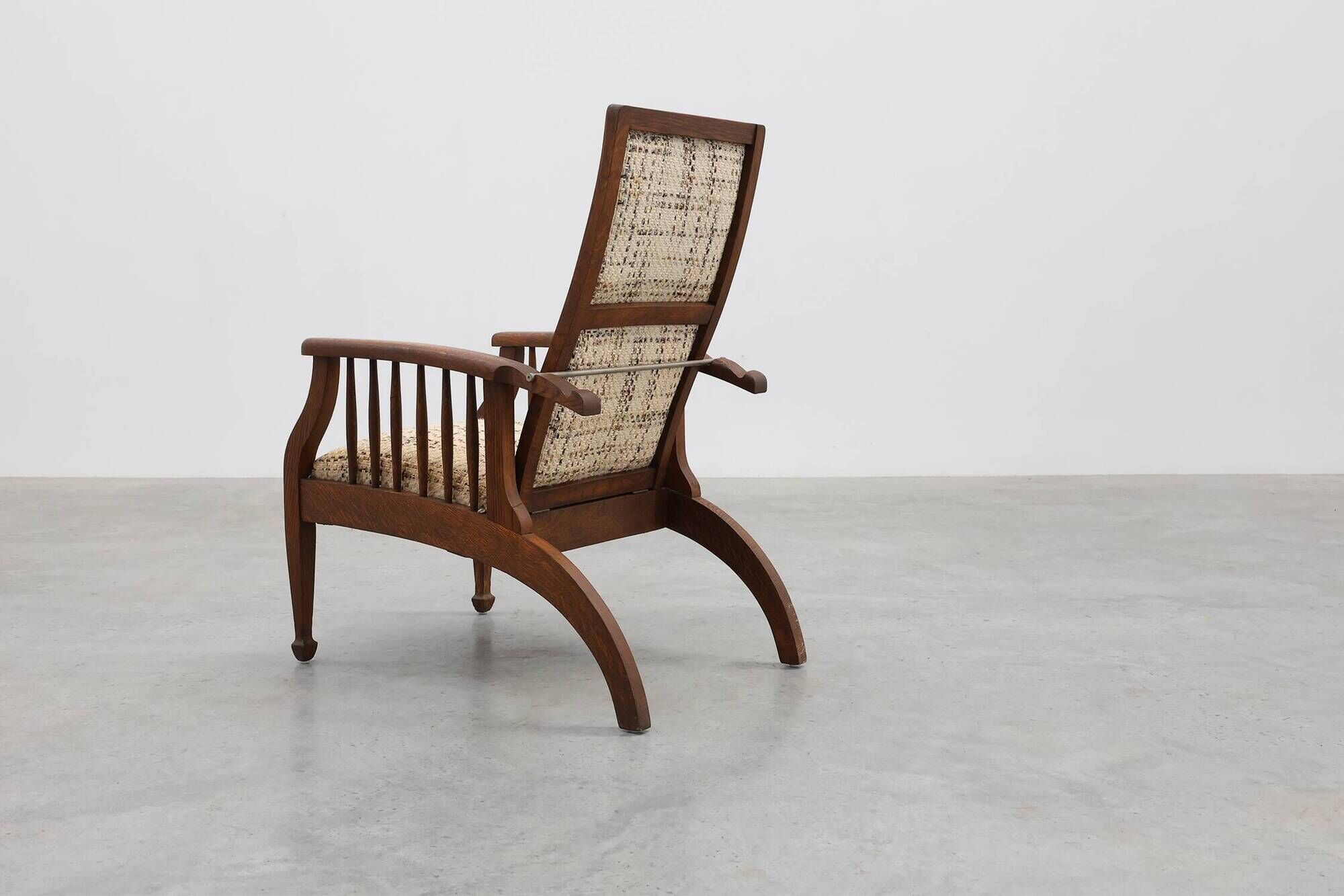 Arts & Craft oak armchair with spindle sides and tweed upholstery, Belgium