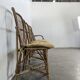 Set of 3 chairs and a rattan armchair.