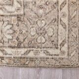 Tapis vintage à motifs floraux beige et marron