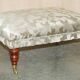 Fabric sofa and footstool, handmade in England.