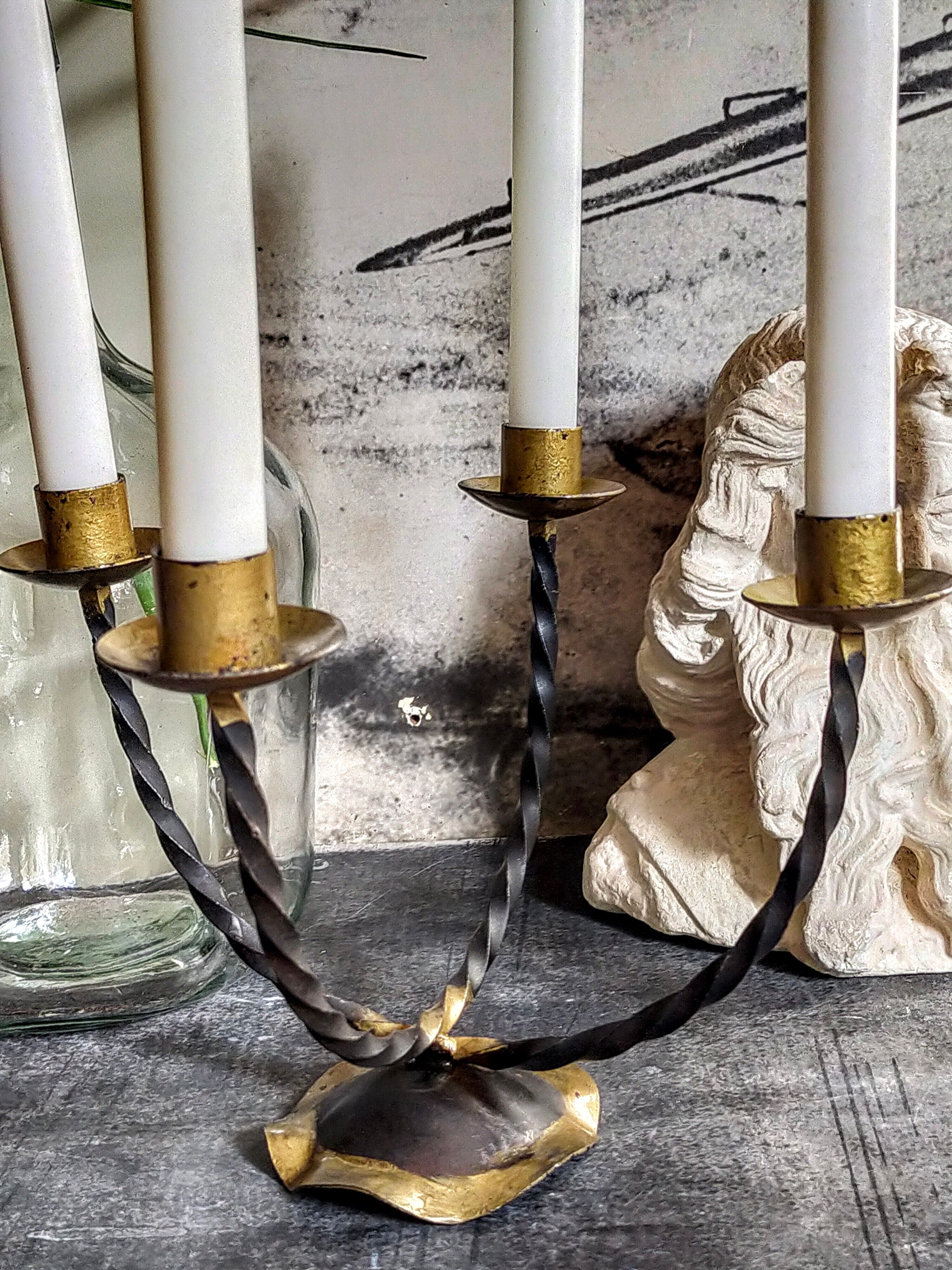 Pair of wrought iron candle holders four arms 50s