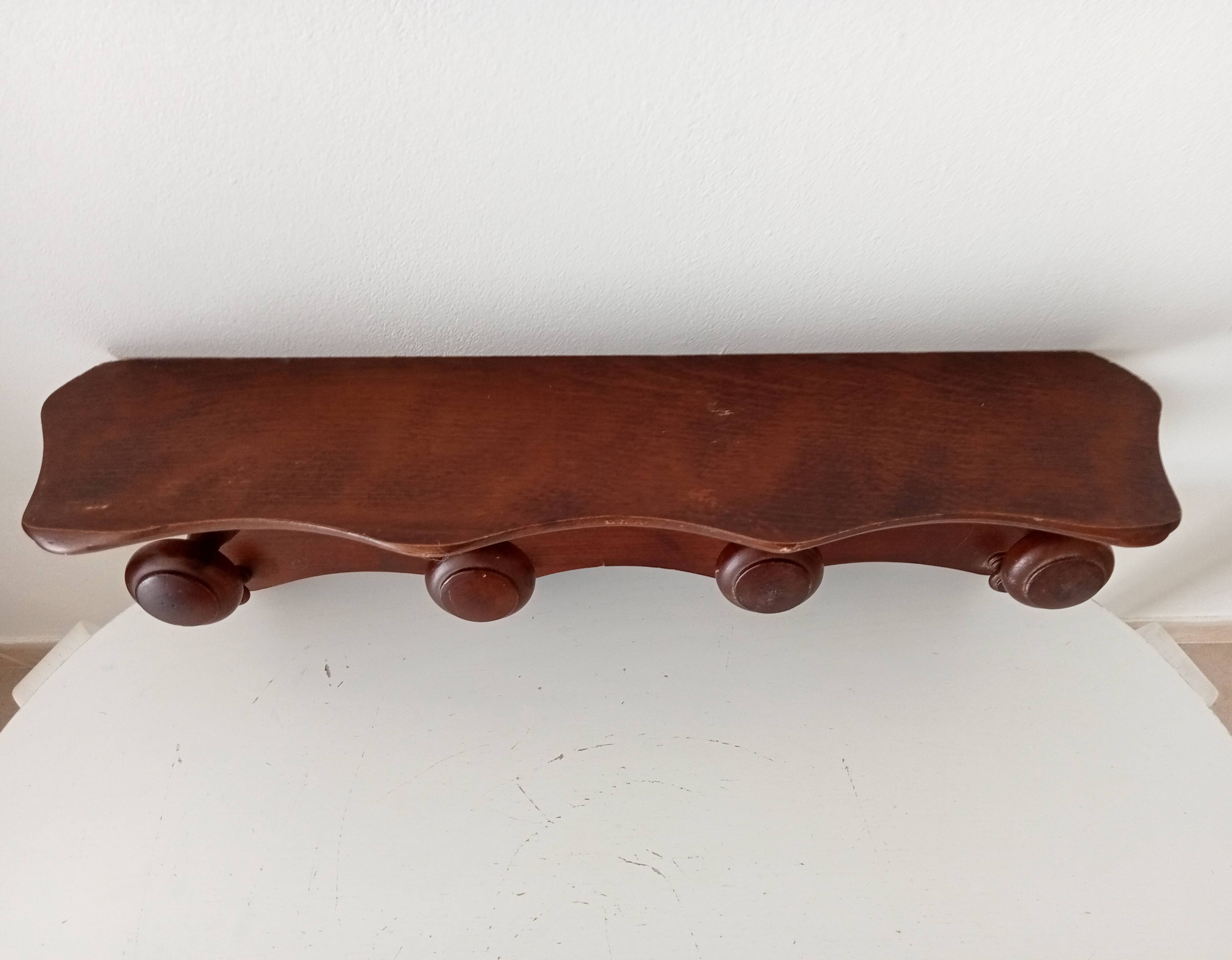 Vintage wall-mounted coat rack in solid oak