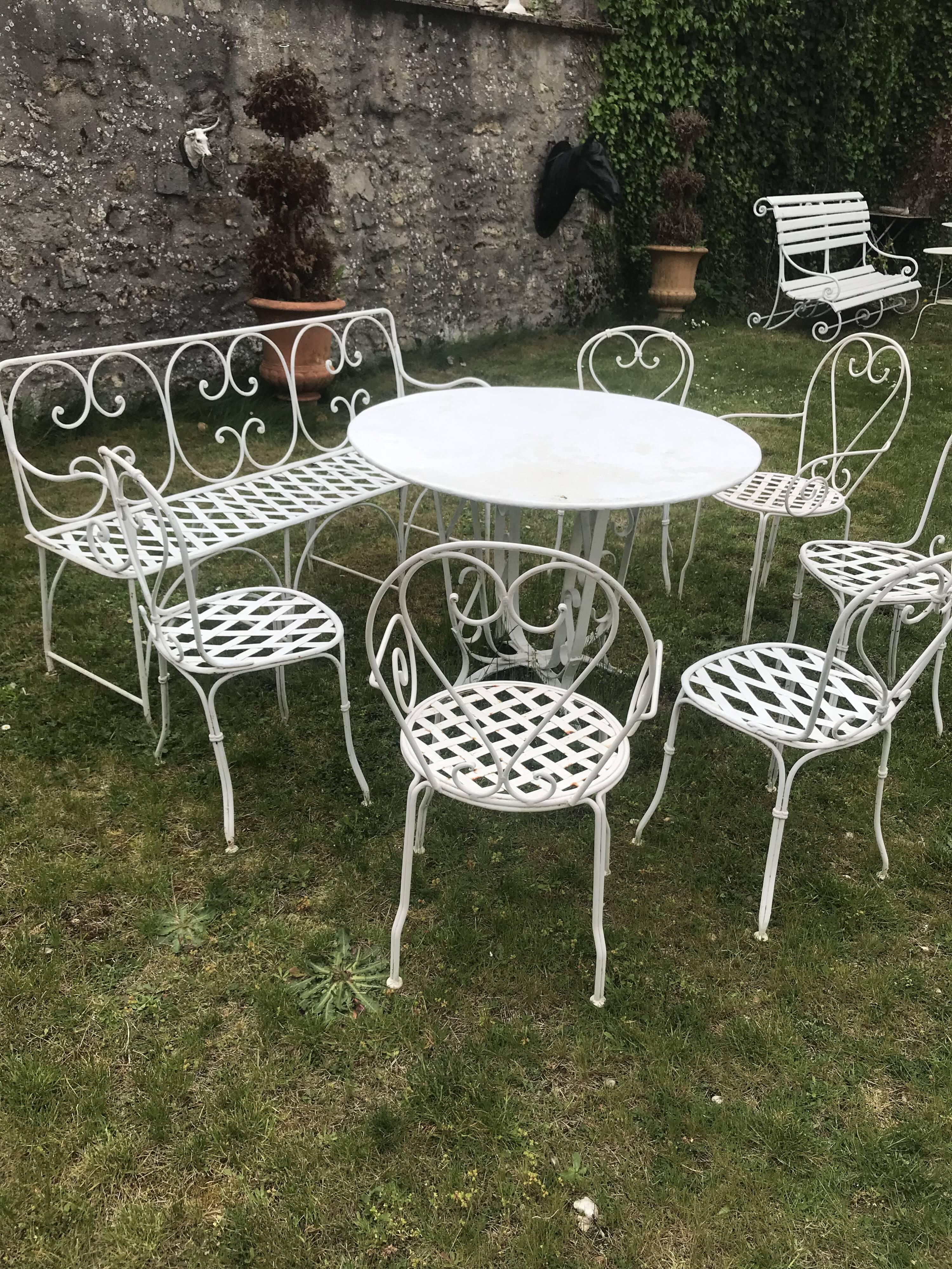 Antique wrought iron garden furniture