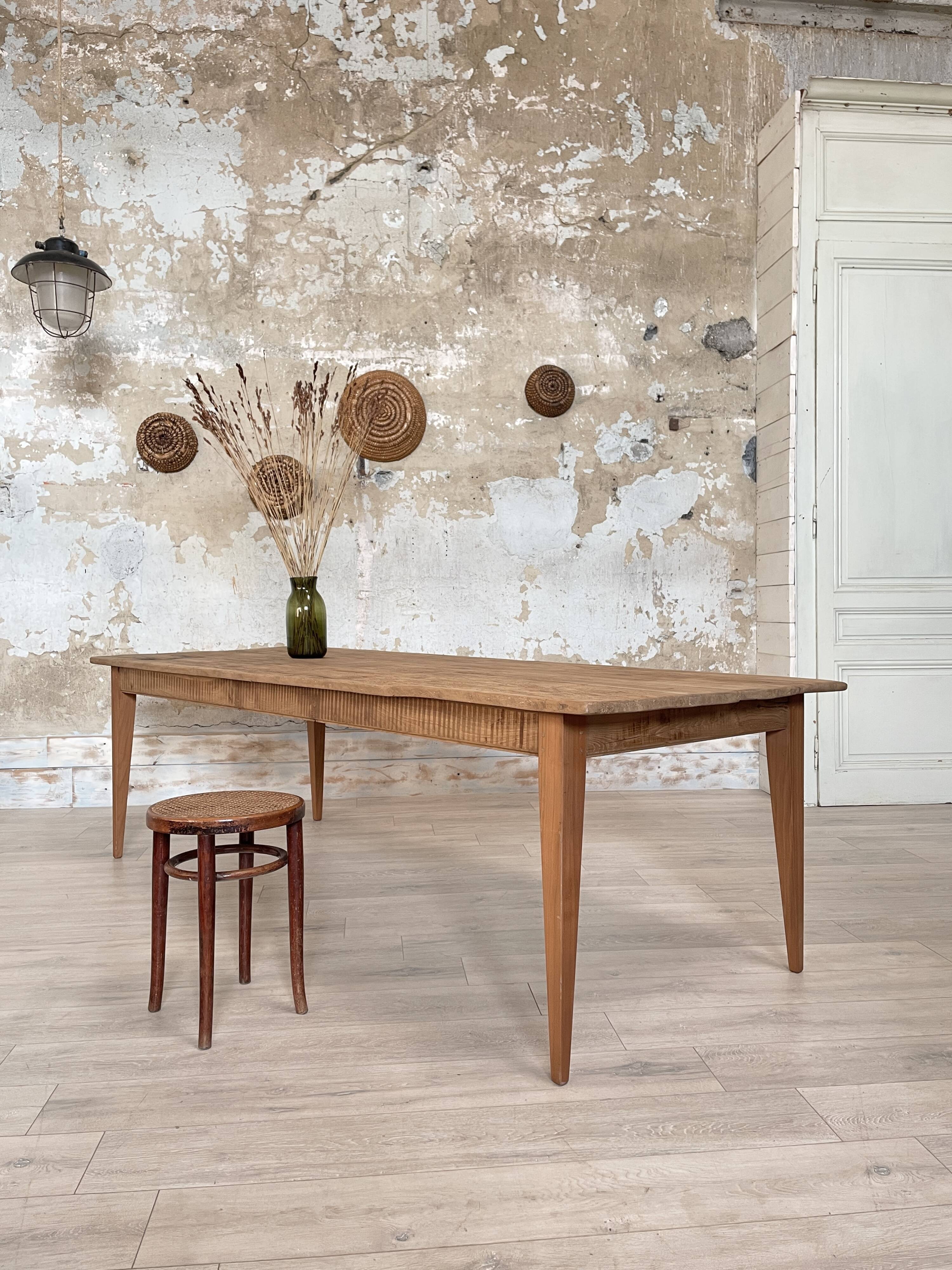 Vintage farm table with spindle legs.