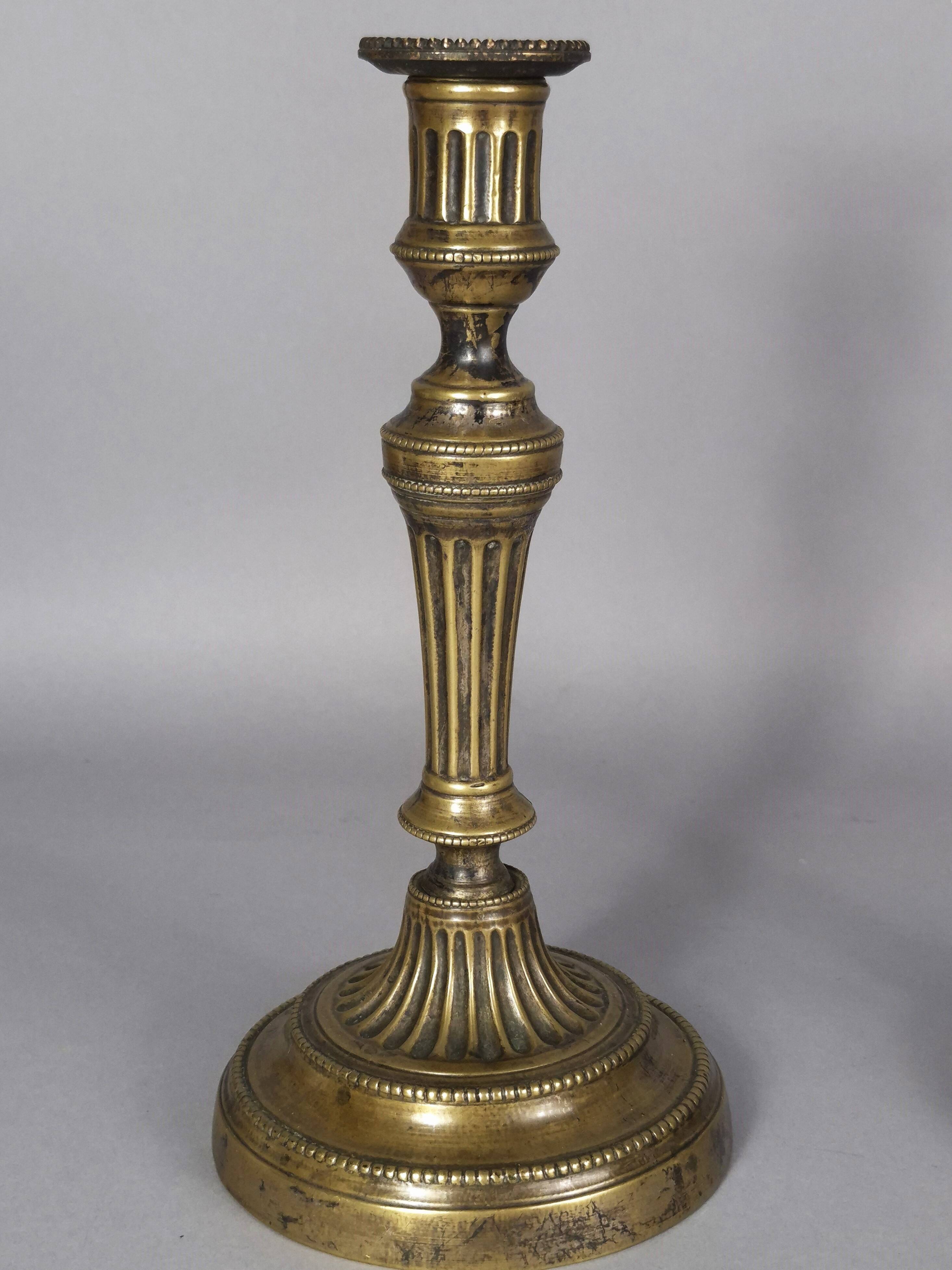 Pair of fluted bronze candlesticks Louis XVI period 27 cm