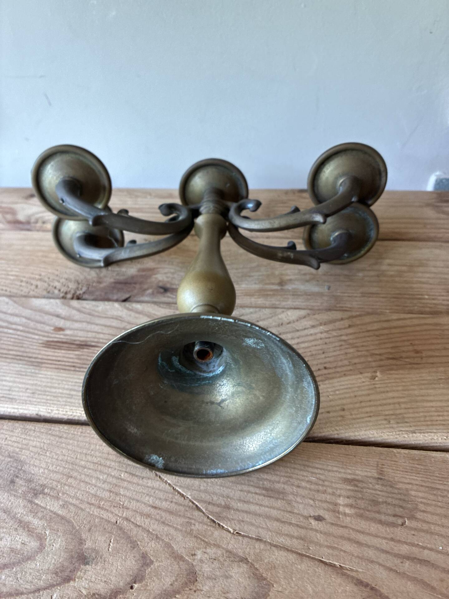 Pair of large 5-light candlesticks in patinated brass, classical style.