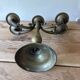 Pair of large 5-light candlesticks in patinated brass, classical style.