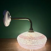 Vintage angled wall lamp with white clichy glass shade and red edging