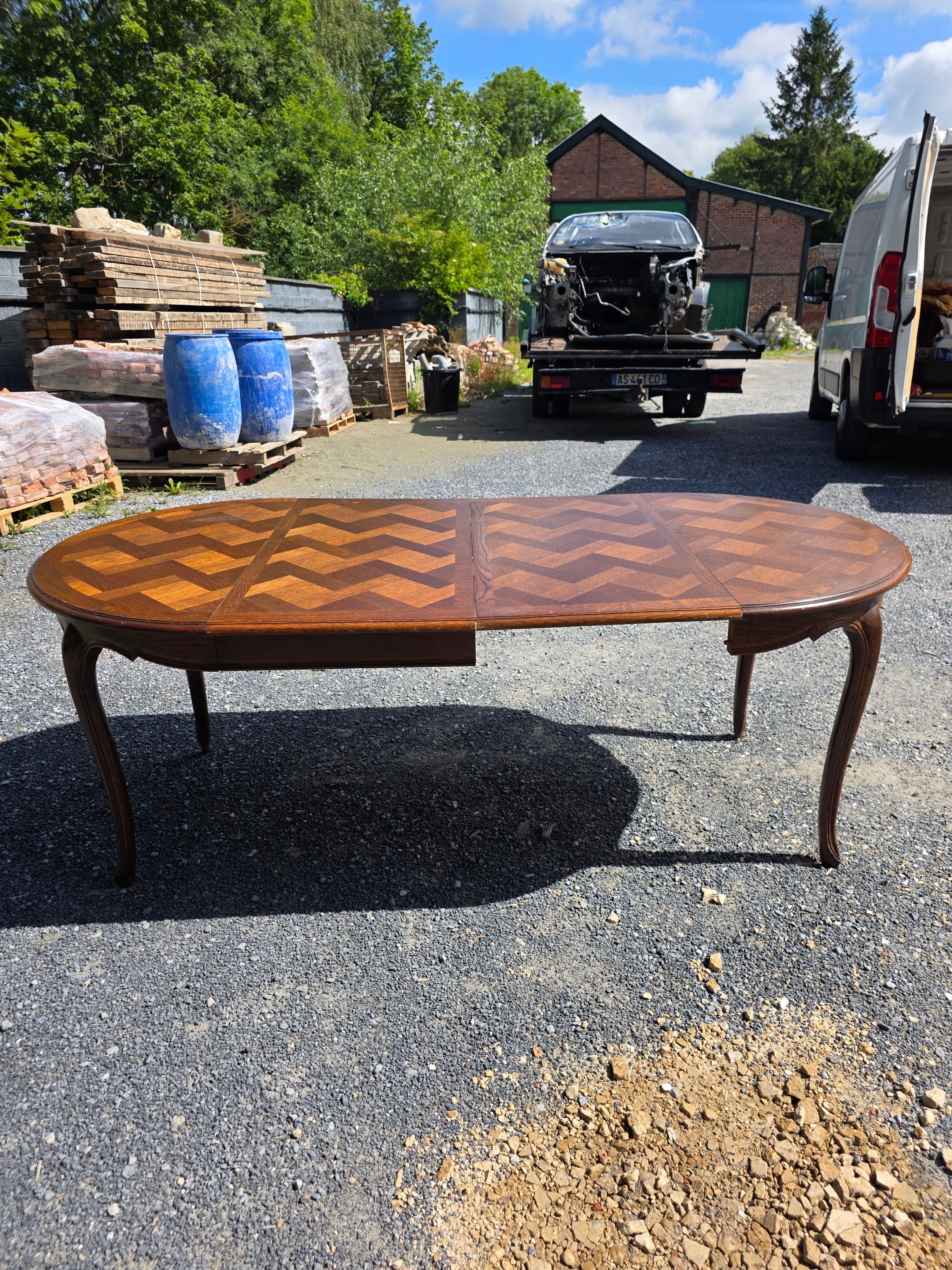 Extendable table in Louis XV style in oak (2 extensions)