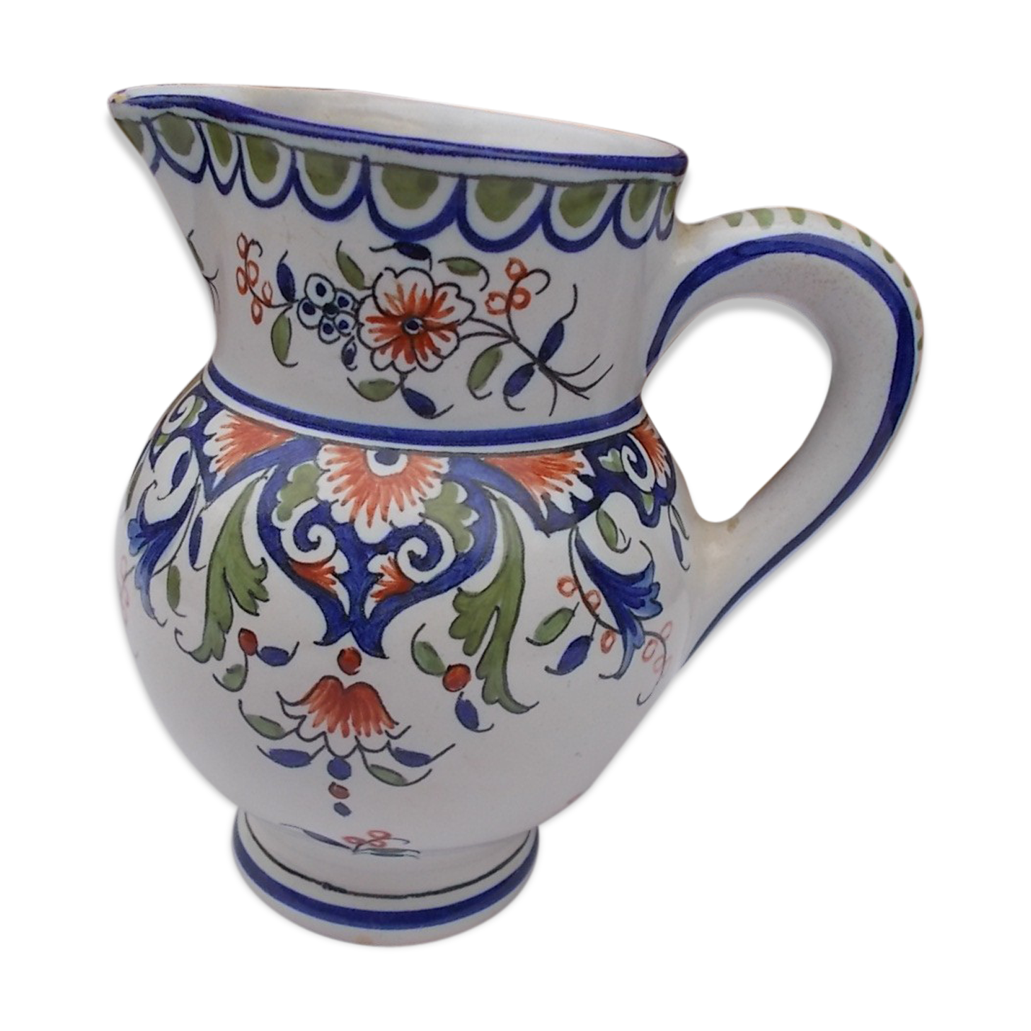 Decorated earthenware jug