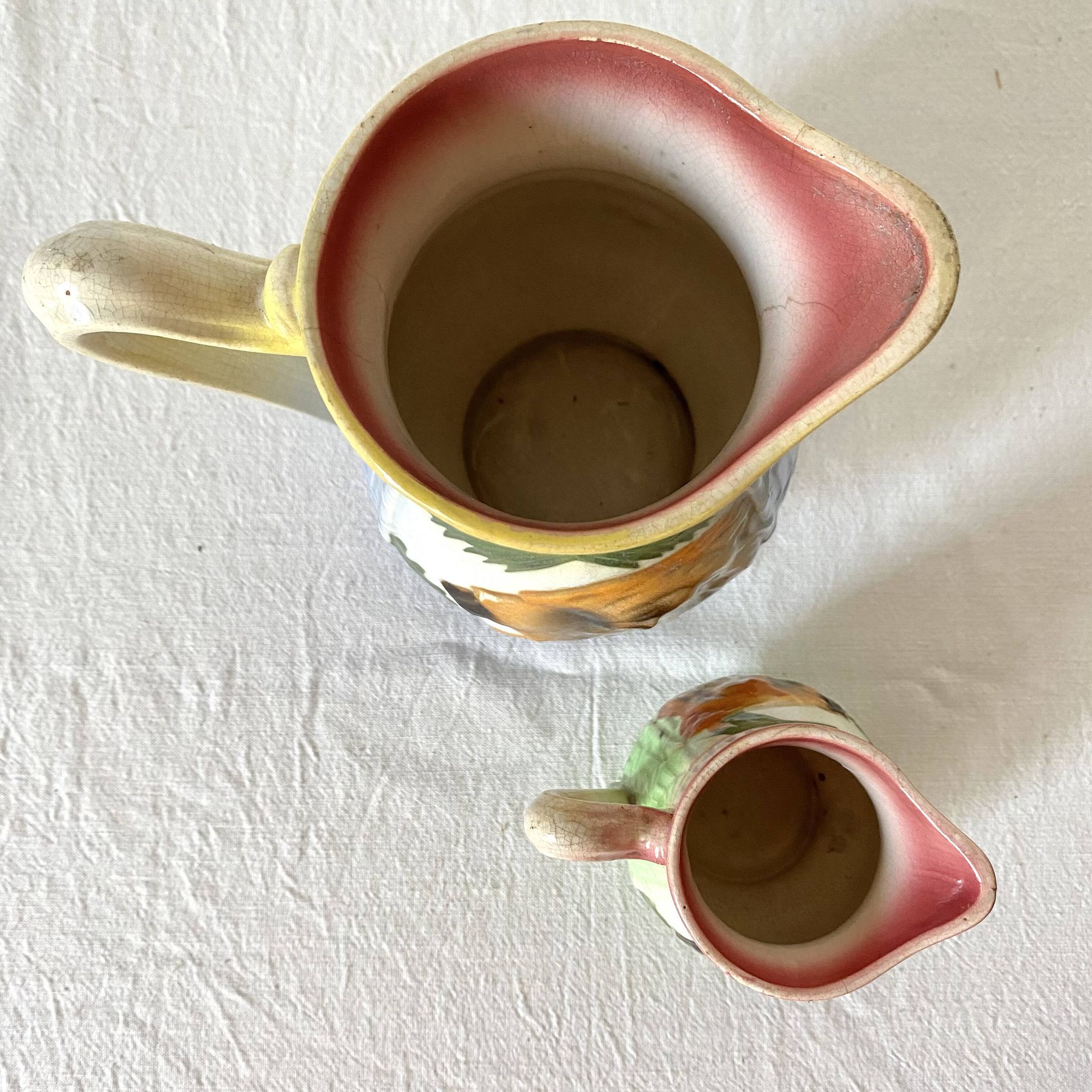 Art Deco pitchers in assorted barbotine lion Poët Laval
