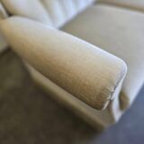 Vintage beige sofa with fringes